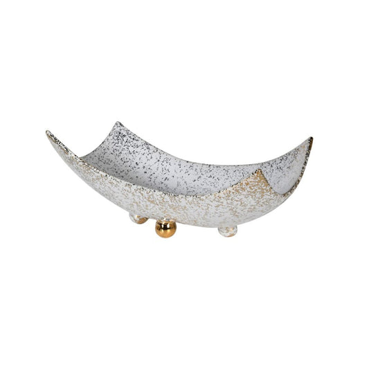 The perfect perch for rings and other important jewellery, this divine trinket tray brings elegance to your everyday essentials. Also can be used in bathrooms as a stylish soap dish. The colouring of white porcelain with specks of gold allows this piece to add dimension to any countertop