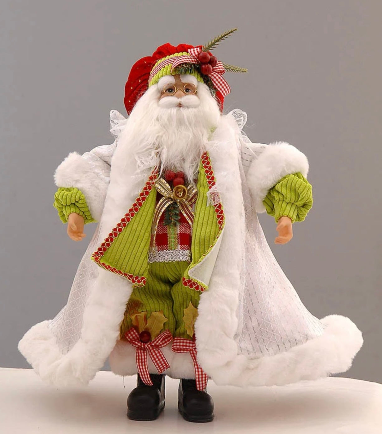 luxurious white, green and red standing Santa Claus Christmas decor”
“elegant Santa figurine for mantel”
“white, green and red Santa holiday decoration”
“Christmas Santa statue for entryway decor”