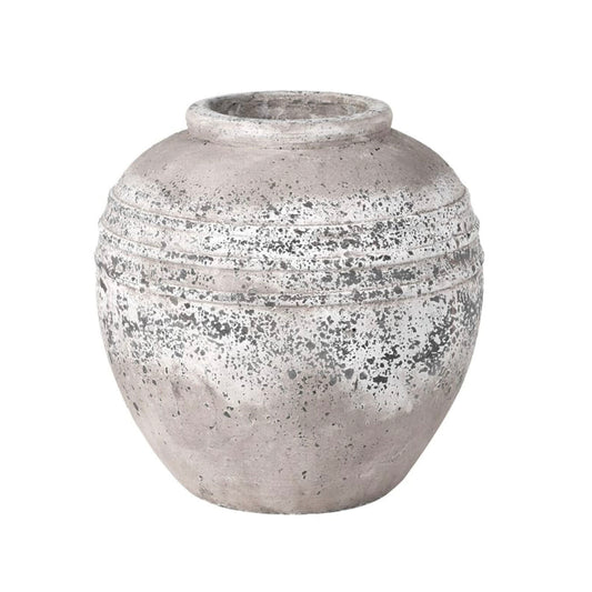 With a shapely silhouette, our distressed stone tapered Jar elevates your space styled anywhere from built-ins, islands to coffee tables. This vases substantial size is perfect for adding visual weight, while a stone style lends depth and dimension to your space. This vase is designed for faux florals and greenery, you can also display real flowers if you put a jam jar or glass inside, or use a florist's cellophane wrap to contain water
