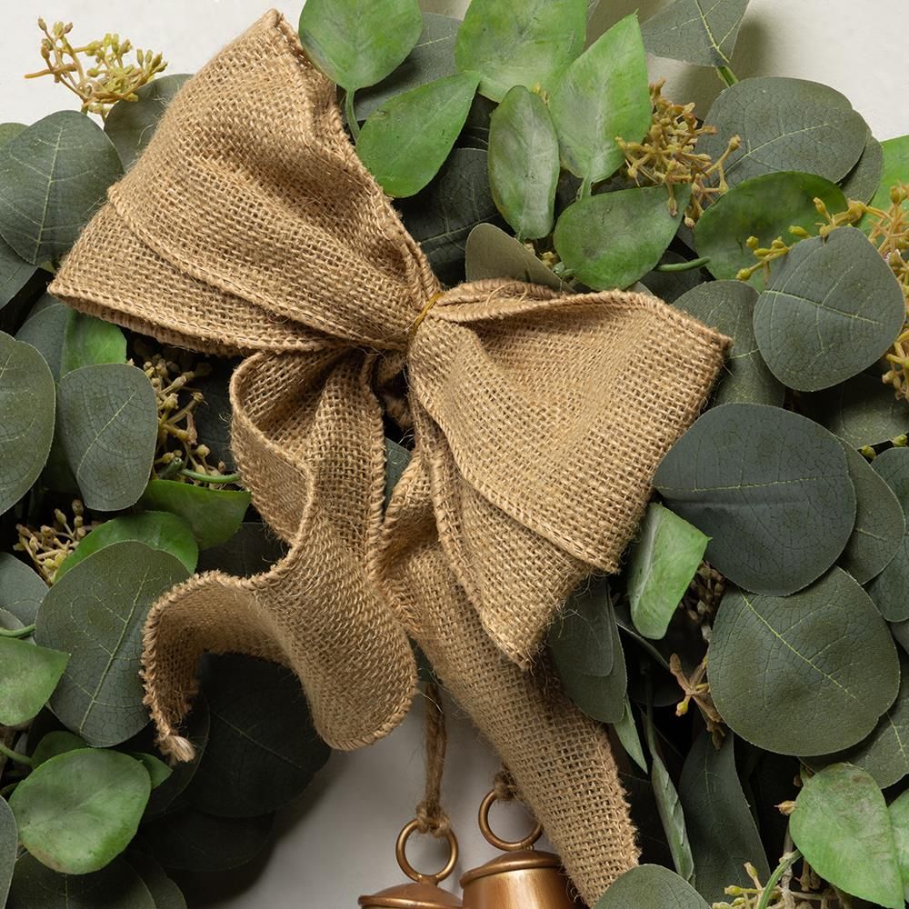 eucalyptus wreath with bells Christmas door decor

rustic eucalyptus Christmas wreath with brass bells

holiday wreath with eucalyptus greenery and bells

neutral Christmas front door wreath eucalyptus