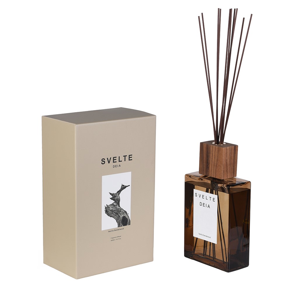 Svelte Deia reed diffuser set with a dark amber glass bottle, natural wood diffuser top, and reed sticks, shown next to its beige packaging box on a white background.
sences diffuser refill

NEW Svelte Deia Diffuser

Mallorcan Garden of Eden

large diffuser

extra large diffuser reeds

extra large diffuser

Diffuser refill

diffuser

brown bottle diffuser refill

brown bottle diffuser