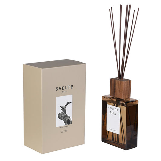 Svelte Deia reed diffuser set with a dark amber glass bottle, natural wood diffuser top, and reed sticks, shown next to its beige packaging box on a white background.
sences diffuser refill

NEW Svelte Deia Diffuser

Mallorcan Garden of Eden

large diffuser

extra large diffuser reeds

extra large diffuser

Diffuser refill

diffuser

brown bottle diffuser refill

brown bottle diffuser