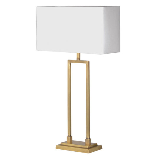 There is strength in simplicity. The lamp has a brushed gold finish open frame and rectangular stepped base. The lamp is topped with an off-white linen rectangular shade with a matching lining.  The rectangular linen shade and brushed gold complement each other and lend a uncluttered feel to a console or night stands while providing warm light to the room.
