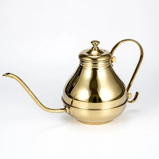 Brass Coffee Kettle Handmade to traditional methods from Turkey, beautiful traditional coffee kettle which enhances the aroma and taste of the coffee.  They look and feel special, a kitchen item most definitely to be kept out on display. 